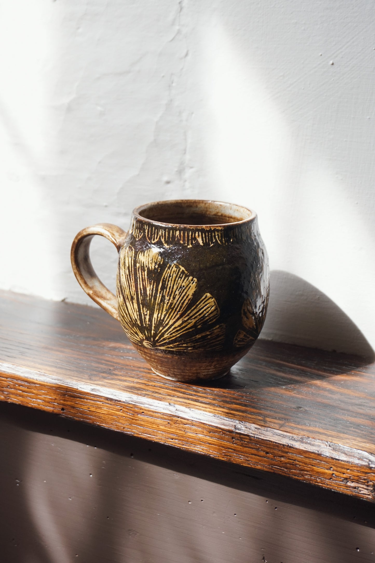 Black Stoneware Sunburst Mug by Steph Tooley