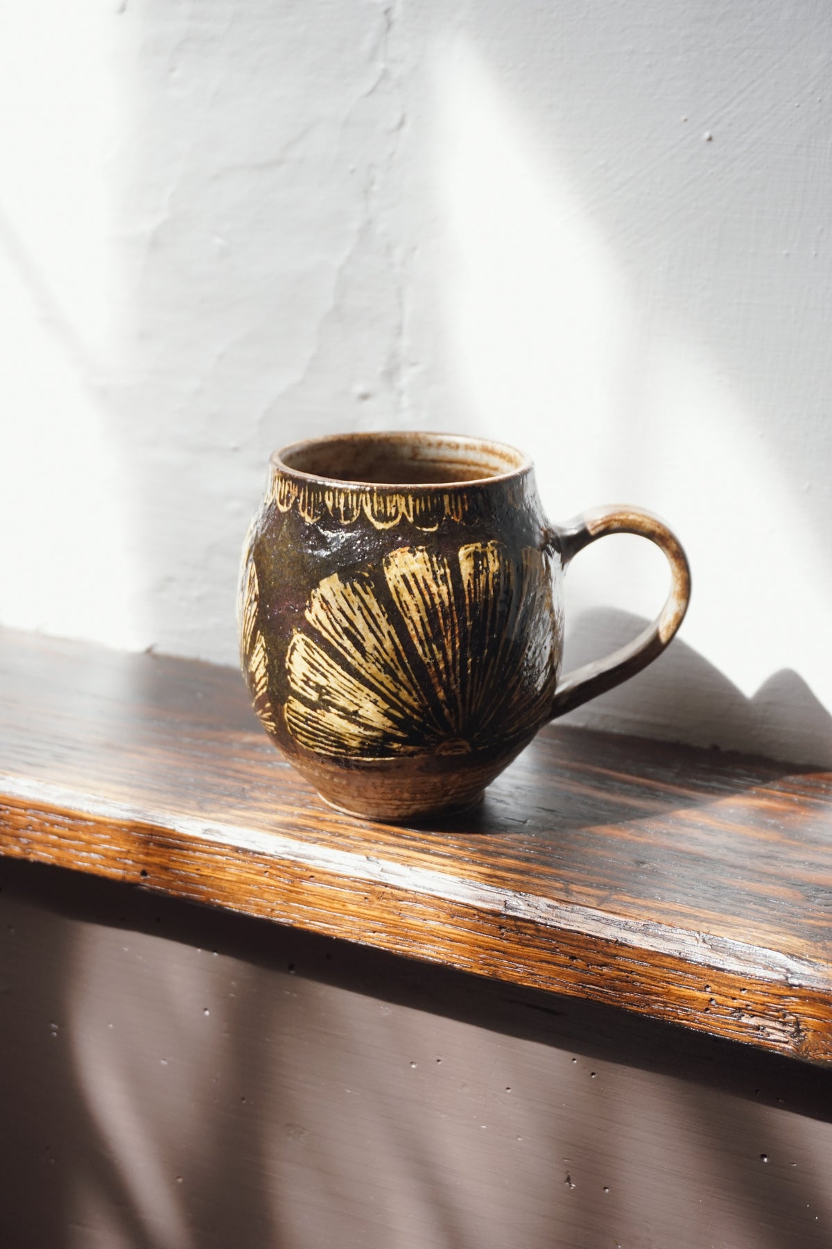 Black Stoneware Sunburst Mug by Steph Tooley