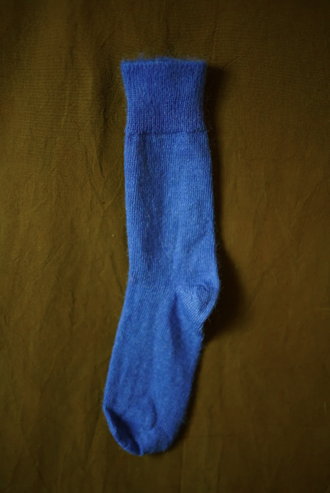 Women’s mohair calf length socks in cobalt blue, shown laid flat, designed to wear with leather boots for warmth and comfort.